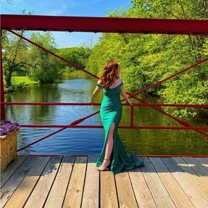 A emerald green prom dress mermaid style prom dress! I loved, I wore it once.